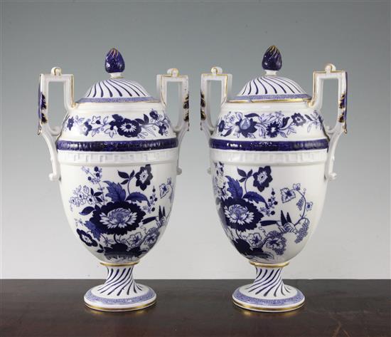 A pair of Copeland blue and white bone china oviform vases and covers, late 19th century, 30cm
